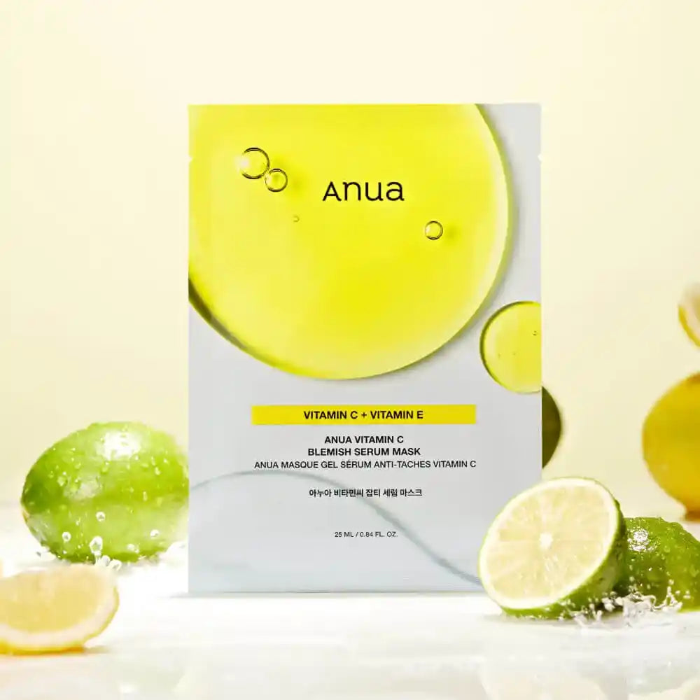Anua Vitamin C + Vitamin E skincare mask packaging with lime and lemon elements on a light background