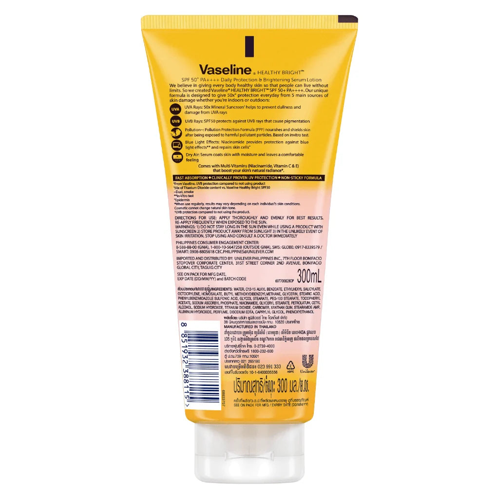 Vaseline lotion tube with yellow label on a white background